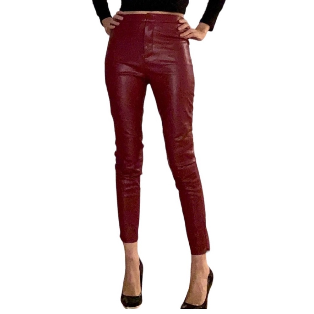 NWOT Zara Faux Leather Leggings. Color is burgundy. Size Medium.